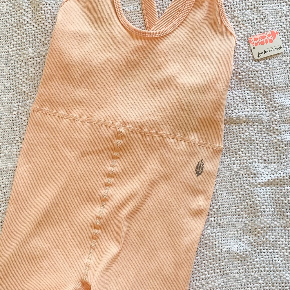 Free People Movement Peach Ribbed onesie M/L